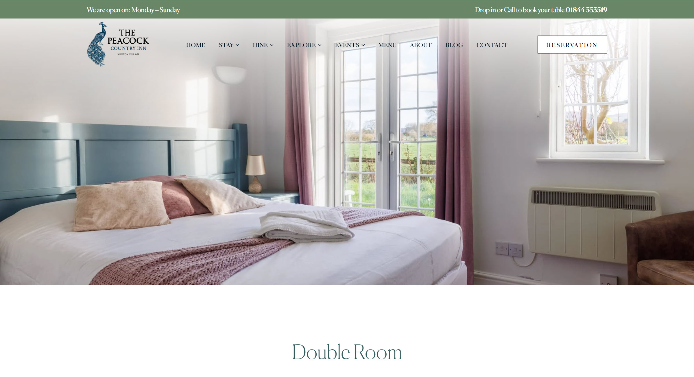 The Peacock Country Inn Double Room page. Light-filled bedroom with countryside view