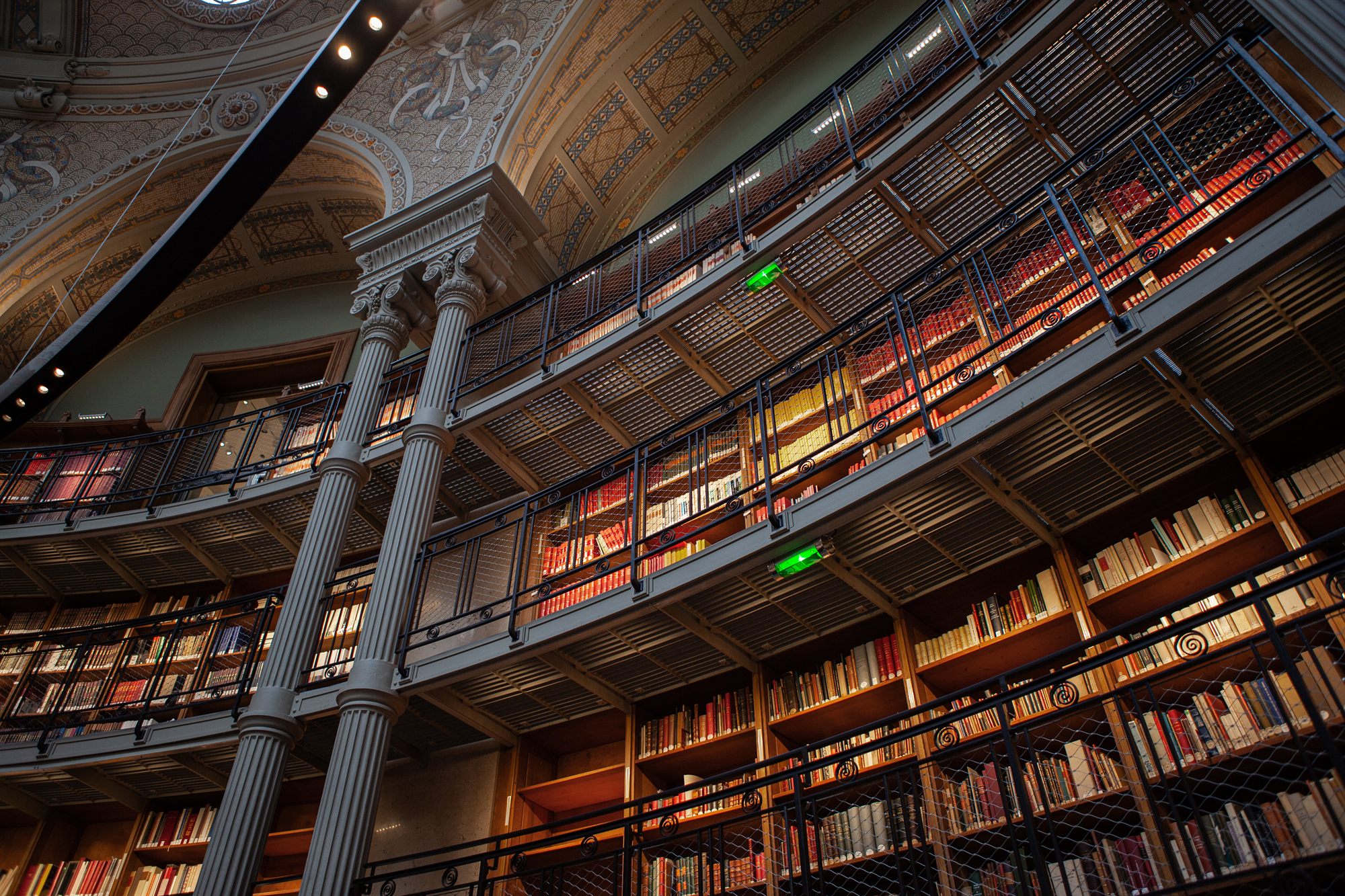 Books shelved around a circular reading hall