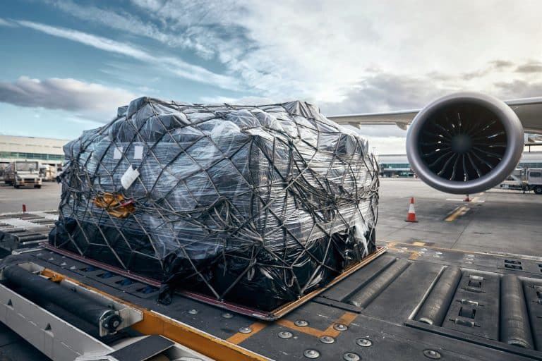 Cargo containers loaded before a flight